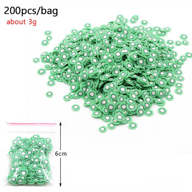 200Pcs Weichen Keramik Obst Scheiben Schleim DIY Nail art Mobilen Schönheit Obst Fimo Perle Zusatzstoffe Telefon Zubehör Für Kinder spielzeug