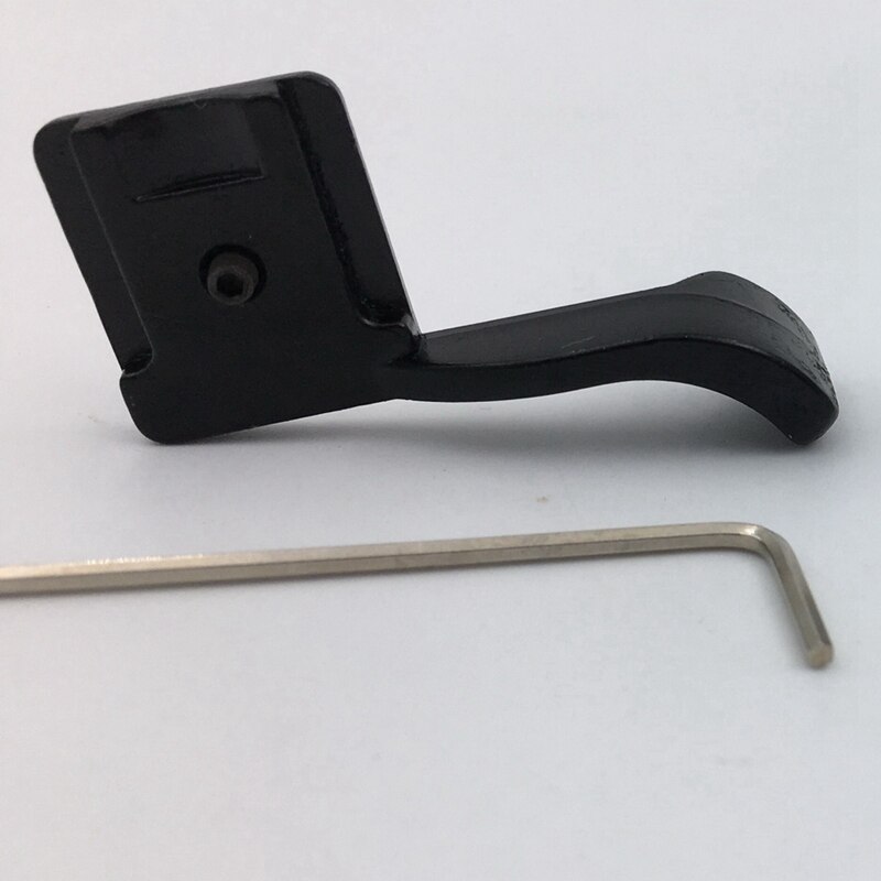 Musta kengän peukalo ylös -kahva kaikille mikrokameroille