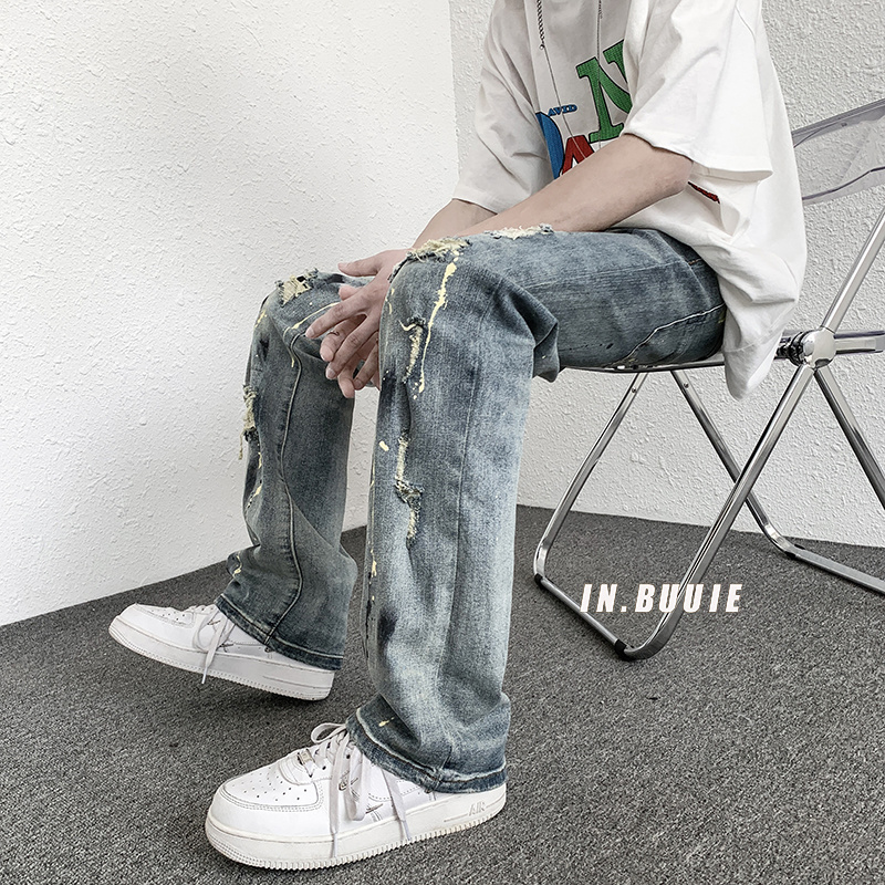 Blu strappato jeans uomo sottile moda casuale gonfio jeans dritti uomo Streetwear anca salto buco denim pantaloni uomo pantaloni M-2XL