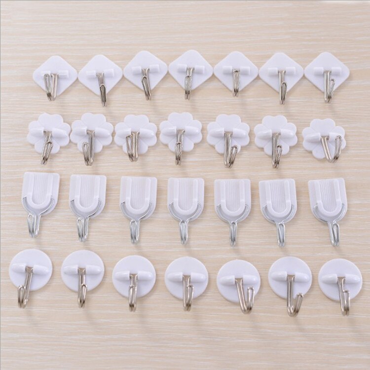Gancho pequeño de trompeta de plástico blanco de dibujos animados, fuerte adhesivo para cocina, accesorios de baño, toalla, bolso de mano, colgador de pared, 1 ud.