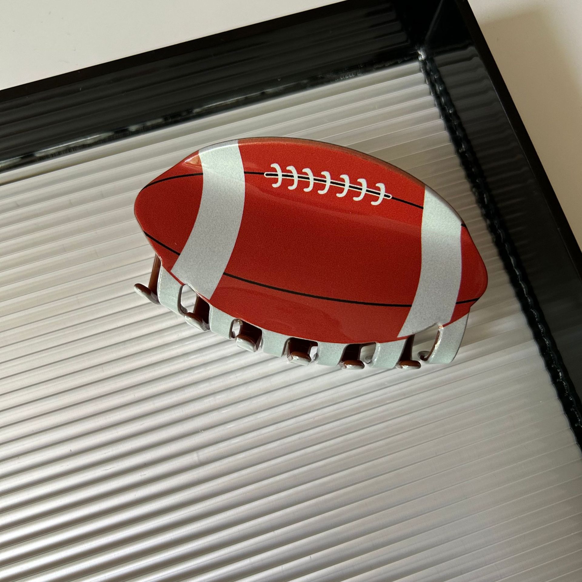 Deportes atléticos fútbol americano baloncesto béisbol pinzas en forma de garra mujeres niñas pelotas de fútbol accesorios para el cabello 2023: Plata