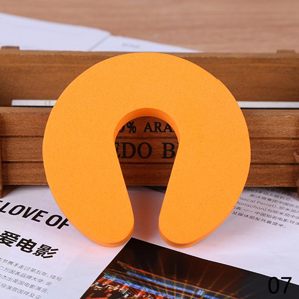 4 protectores de dedos multicolores para niños, protectores de seguridad suaves para puertas para bebés, tapón de puerta para niños, cerraduras seguras para bebés: Naranja