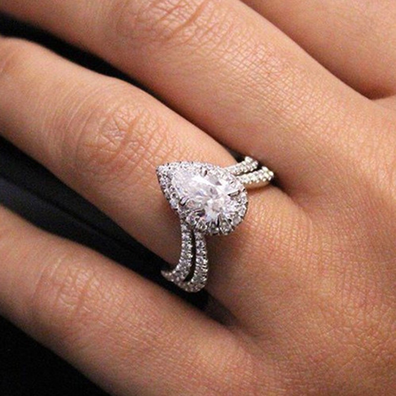 Huitan Romantic Wedding Engagement Ring with Clear Pear Shape Cubic Zirconia Prong Setting Jewelry Rings for Women