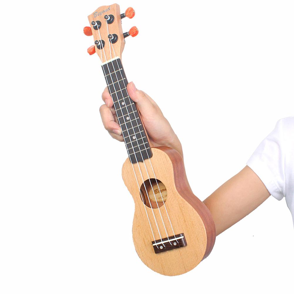 Mini guitare de poche en bois de séquoia, Ukulele 4 cordes, Mini Instrument de musique hawaïen, jouet avec sac, pour enfants, 17 pouces