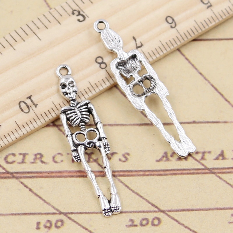 20Pcs Charms Schedel Skelet Man 39X9Mm Tibetaans Zilveren Kleur Hangers Antieke Sieraden Maken Diy Handgemaakte Craft