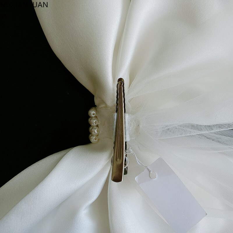 Witte minimalistische witte oversized strik haarspeld sluier die bruidshoofdtooi bedekt bruiloft accessoires