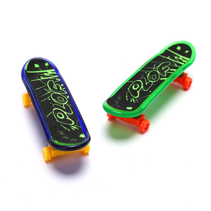 1 pc söta festleksaker barn barn mini fingerbräda greppbräda legerad skateboard leksaker färg slumpmässig