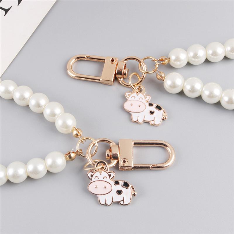 2 sztuk kreatywny brelok krowa wisiorek breloczek sztuczna perła klucz wisiorek (biały)