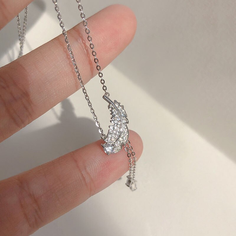 ANENJERY-collar de plumas de circonia cúbica brillante para mujer, Color plateado, collar de borla larga y delicada, S-N732