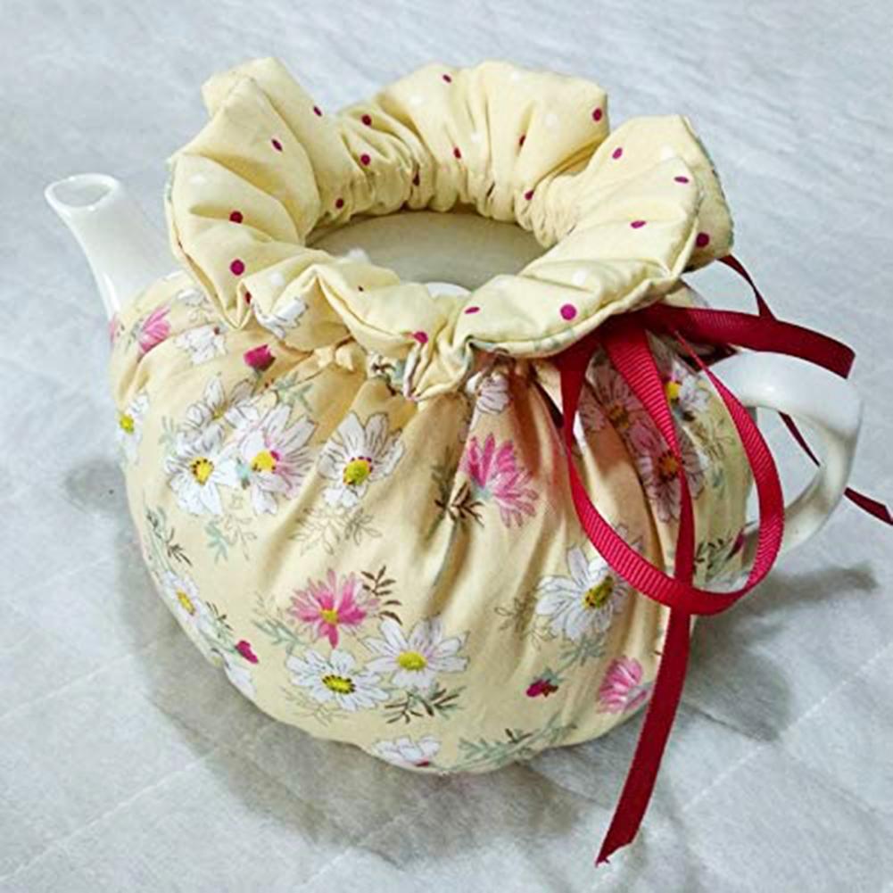 Tetera con estampado de flores, cómoda, Vintage