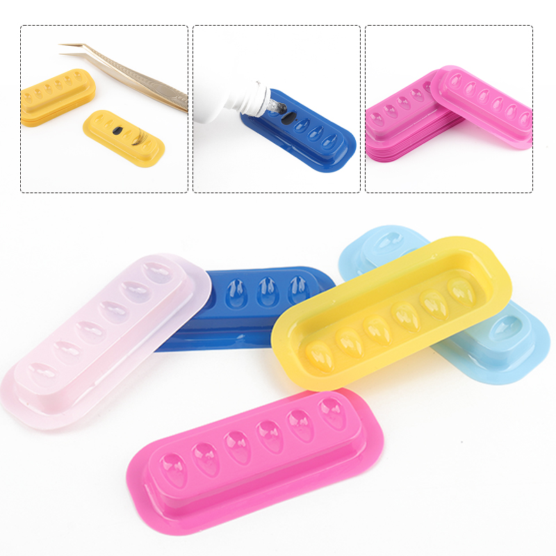 100 pièces porte-colle à cils Palette Extension de cils support adhésif tampons bande en forme de joint en plastique Palette cils artiste accessoires