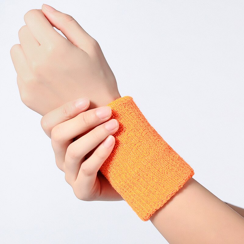 1pc armbånd sports-svedbånd let at tørre åndbart håndbånd sved håndledsstøtte bøjle omslutter vagter til gym volleyball: Orange