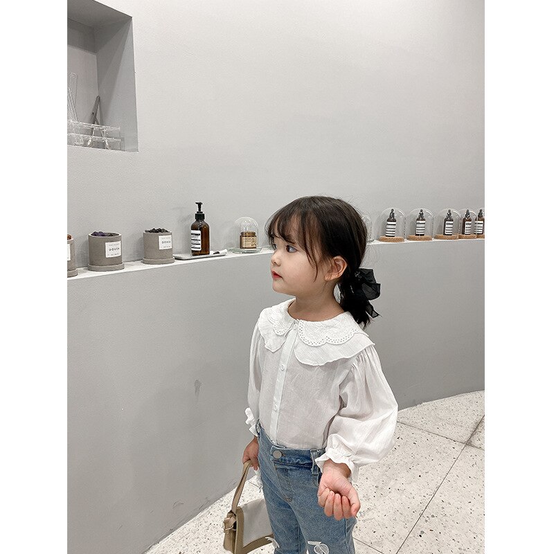Camisa blanca pura de para chicas otoño contrajo la nueva camisa suelta de manga de encaje camiseta para niños