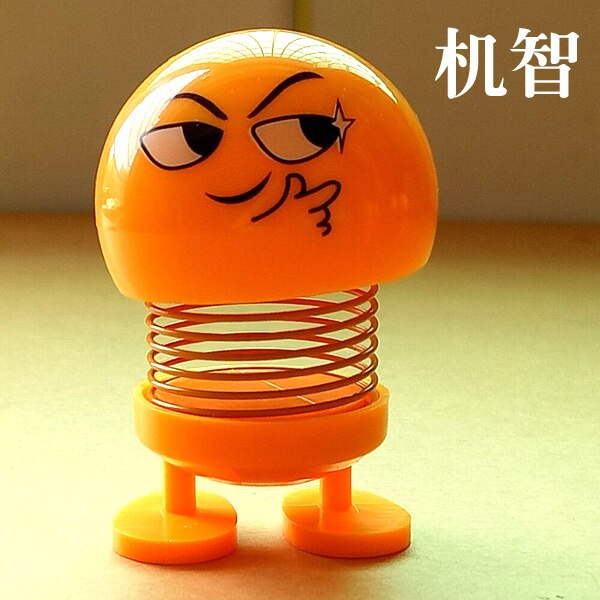 Śmieszne słodkie lalki twarzy pouruszająca głową lalka w samochodzie kreatywny samochód słodkie ozdoby wiosenne wyrażenie: smart