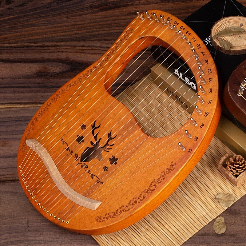19 leierharfe aus mahagoniholz, musikinstrument mit stimmschlüssel und ersatzsaiten