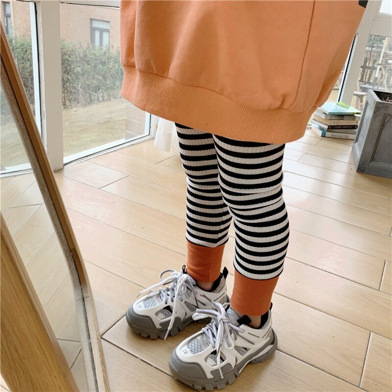 Baby meisjes zwart wit gestreepte stiksels leggings katoen lente zomer slim fit geribbelde lange broek patchwork broek