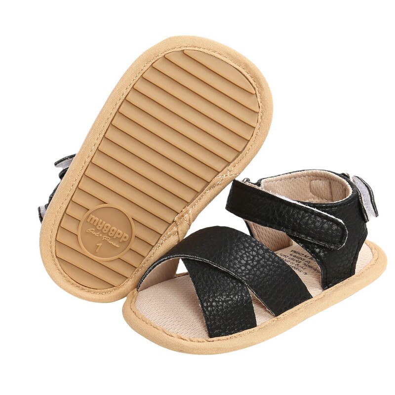 Sandalias de cuero para bebés, niños y niñas, zapatos planos antideslizantes con punta abierta y correa entrecruzada