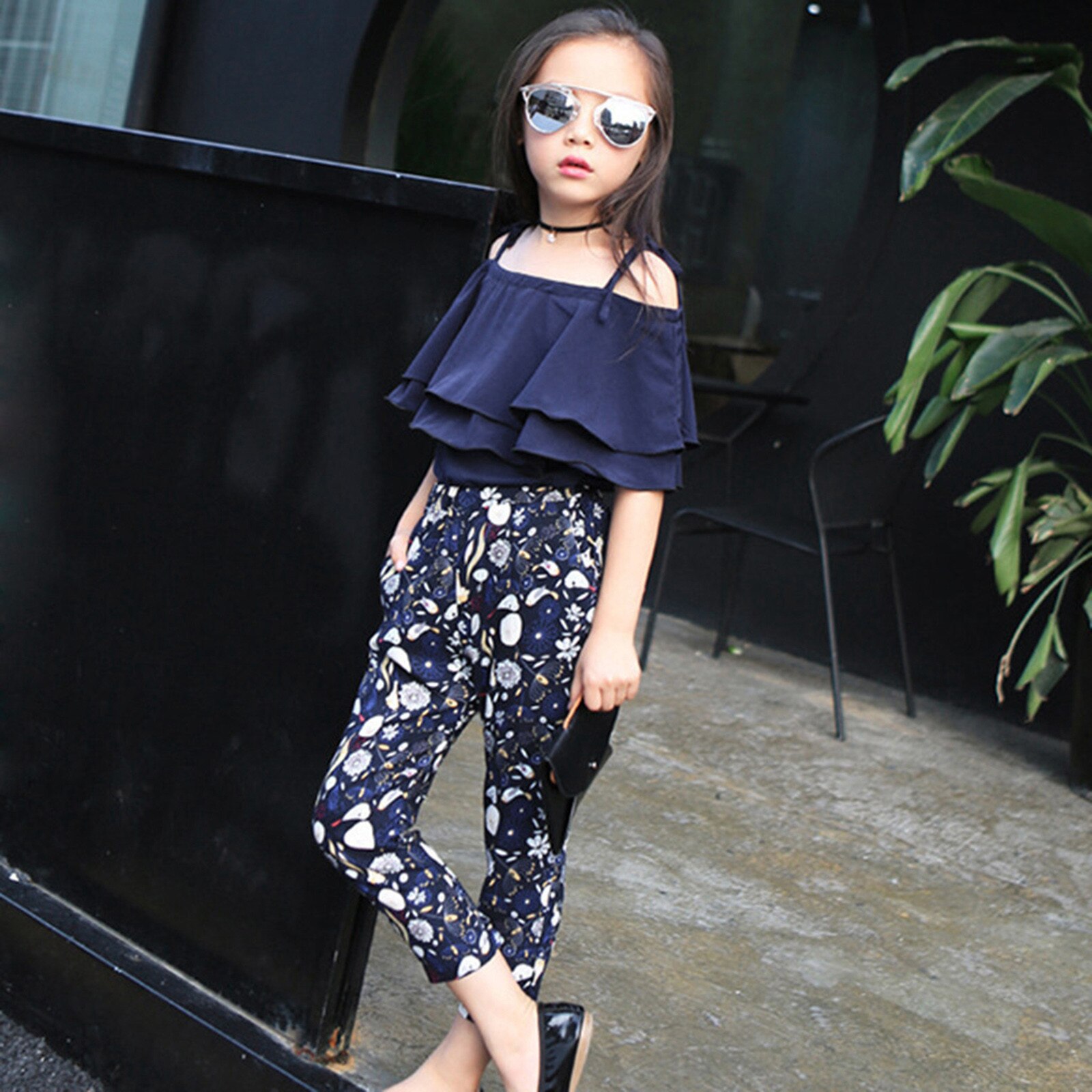 Moda bambini ragazza abbigliamento estate spalla aperta Sling Ruffle T-Shirt top + pantaloni floreali Set elegante per abiti da ragazza grande adolescente