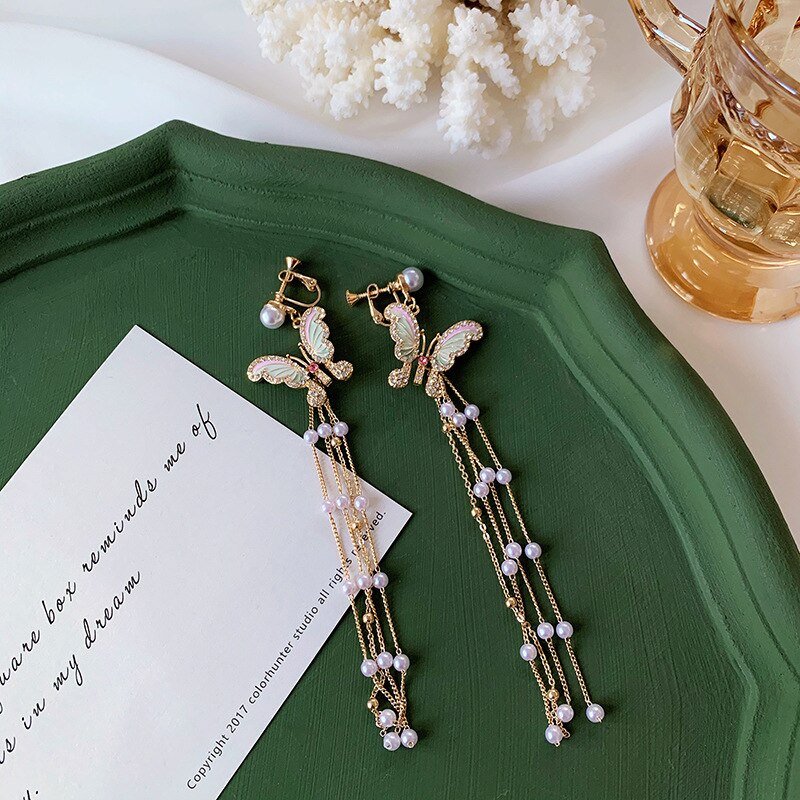 Temperamento barroco pérolas borboleta clipe brincos de luxo strass longo simulado pérolas borla borboleta clip em brincos