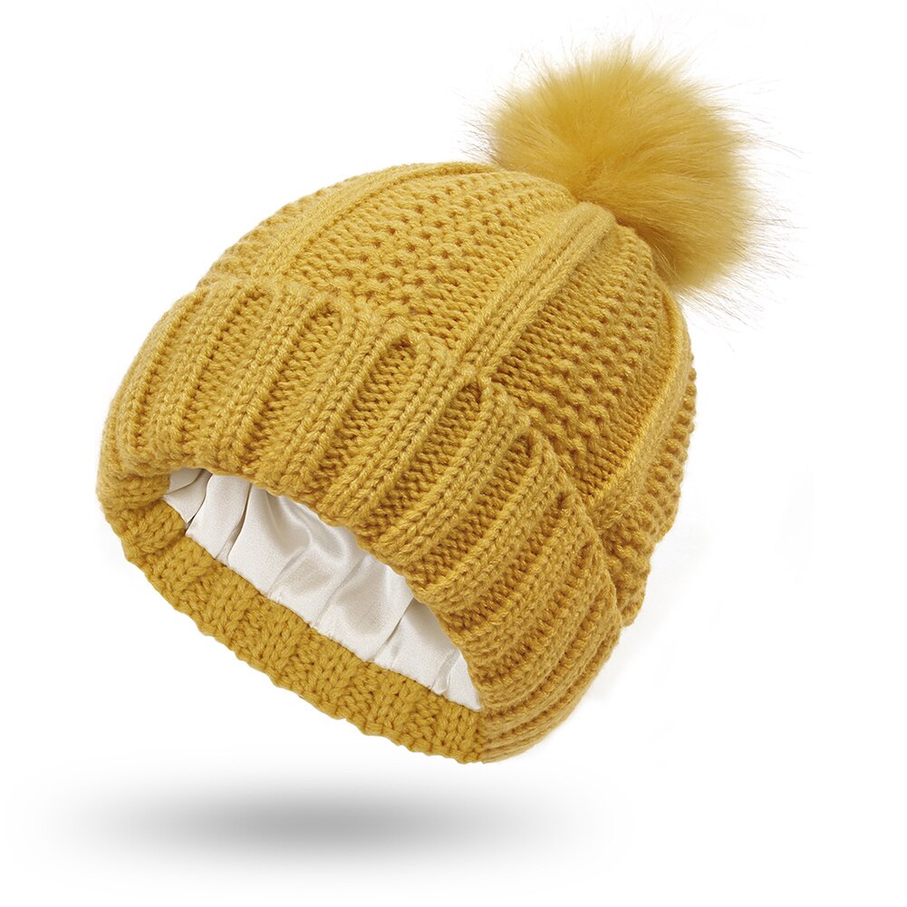 Gorros de satén con forro de seda para mujer, gorros de punto con pompón de piel sintética, para invierno: yellow