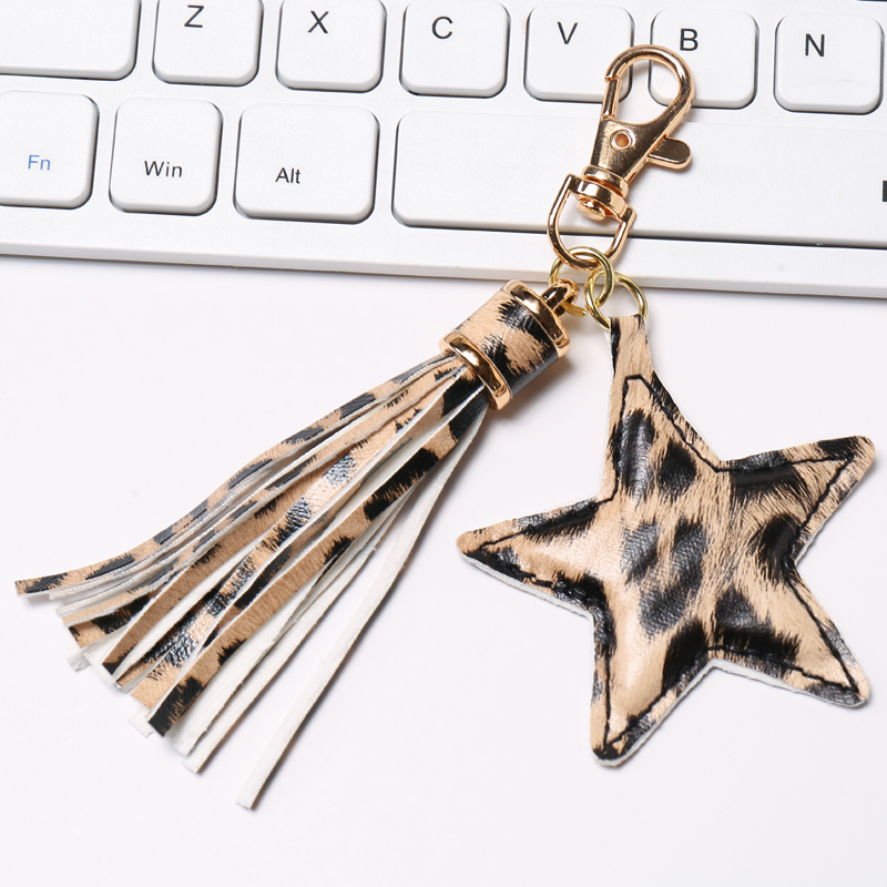 LLavero de borla de cuero PU a la para mujer y niña, colgante de estrella, llaveros con cierre de langosta, accesorios para bolso