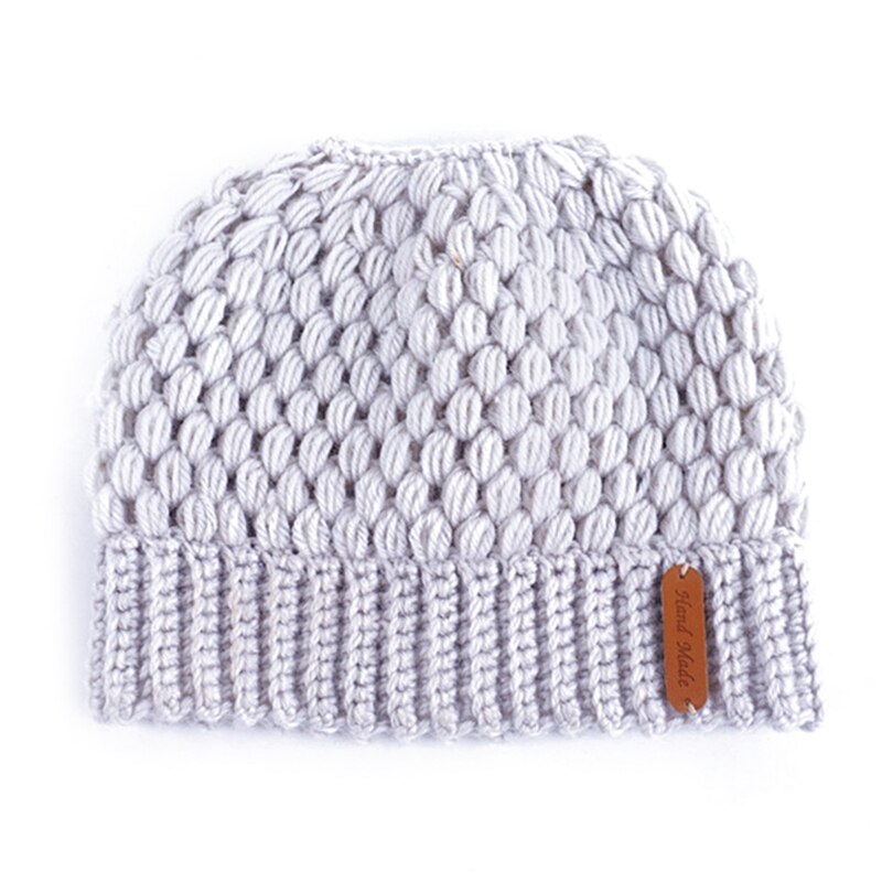 Winter gebreide mutsen winter dames muts dames meisjes stretch gebreide muts met label rommelige knot paardenstaart muts met gaten warme mutsen mutsen: Bg
