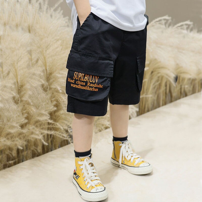 Pantaloncini per ragazzi vita elastica Casual pantaloni per neonati lunghezza al polpaccio per bambini pantaloni solidi pantaloni morbidi abbigliamento per bambini 5-14 anni