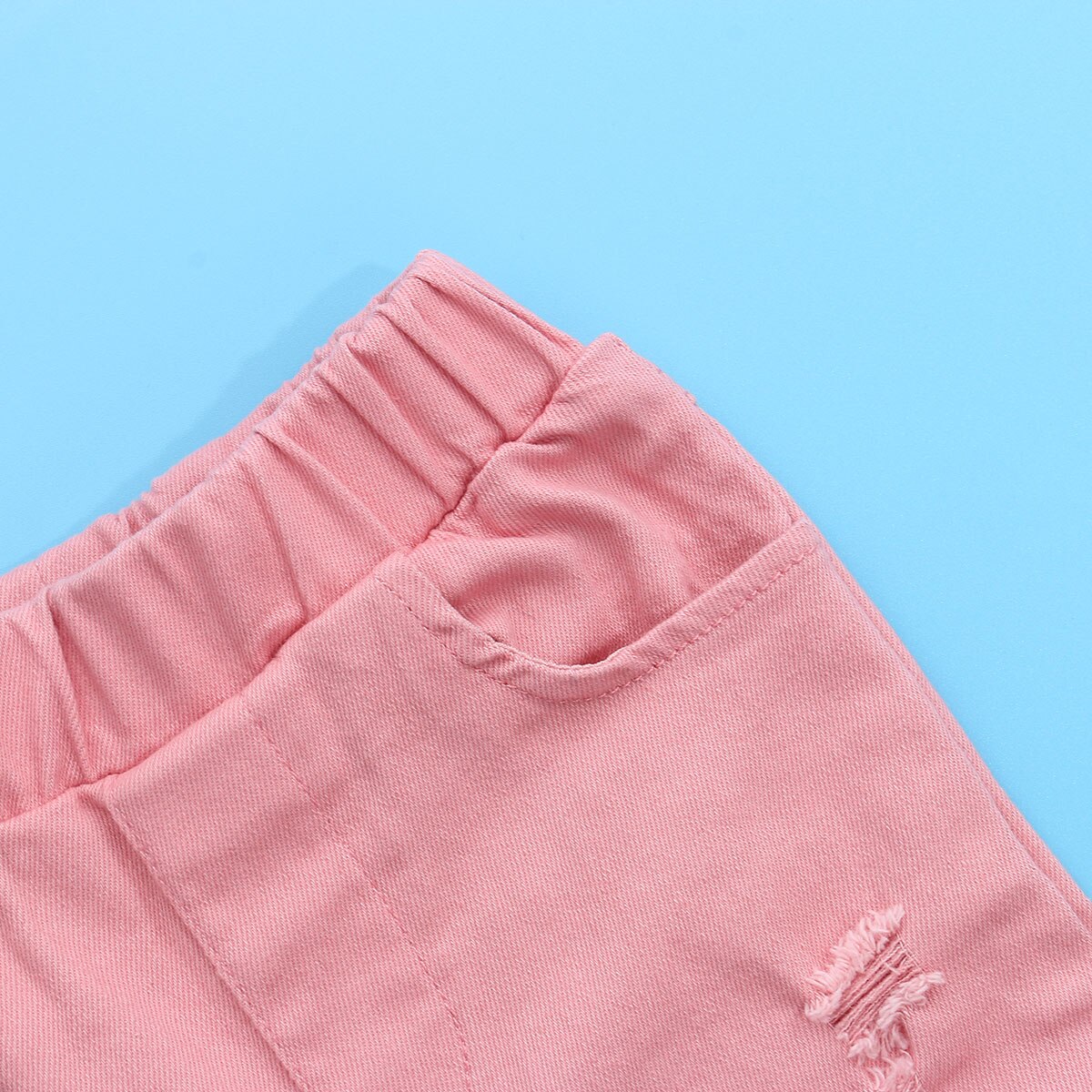 Icute flickor byxor stil jeans utsvängda byxor barn små barn baby barn jeansbotten stövel skurna hål rosa byxor