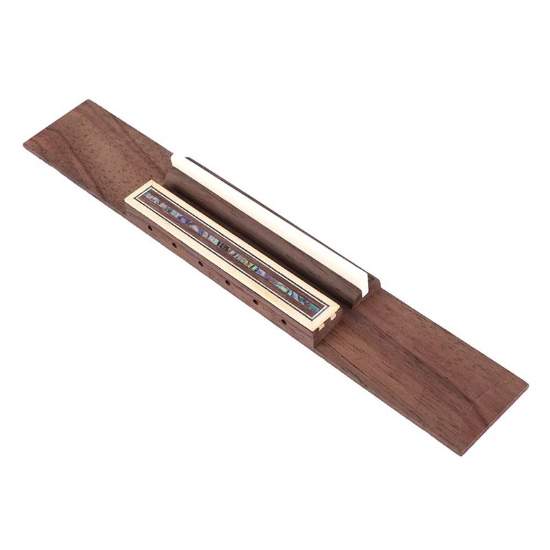 Klassieke gitaarbrug van palissanderhout en klassieke gitaarmoer van runderbot en klassieke gitaarkam van runderbot