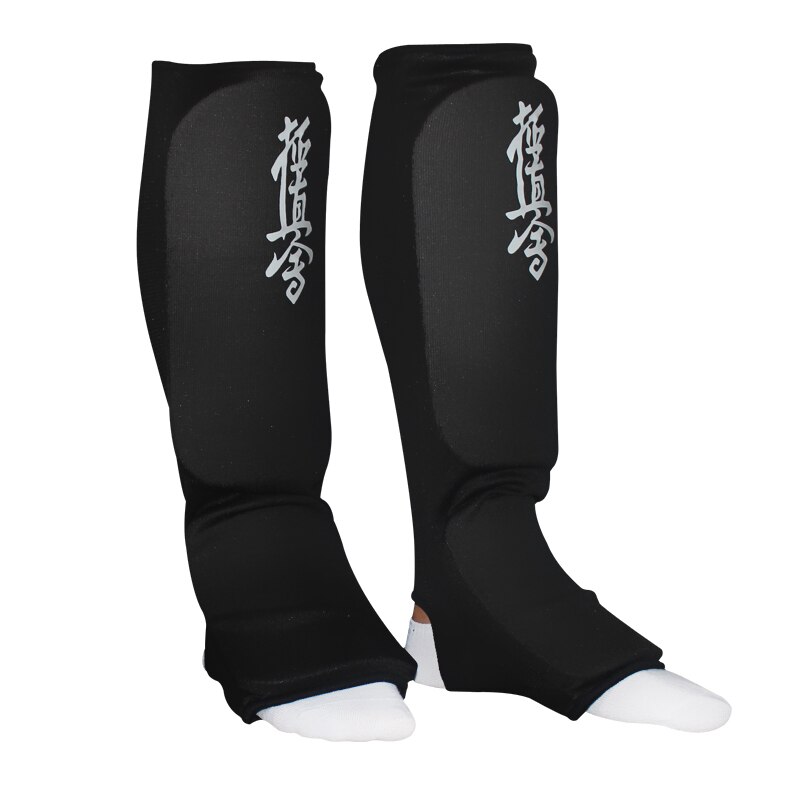 Espinilleras de kárate para niños y adultos, protector de pierna de Taekwondo MMA, almohadillas para el pie, almohadilla de tela blanca y negra, de buena , novedad: Negro / S