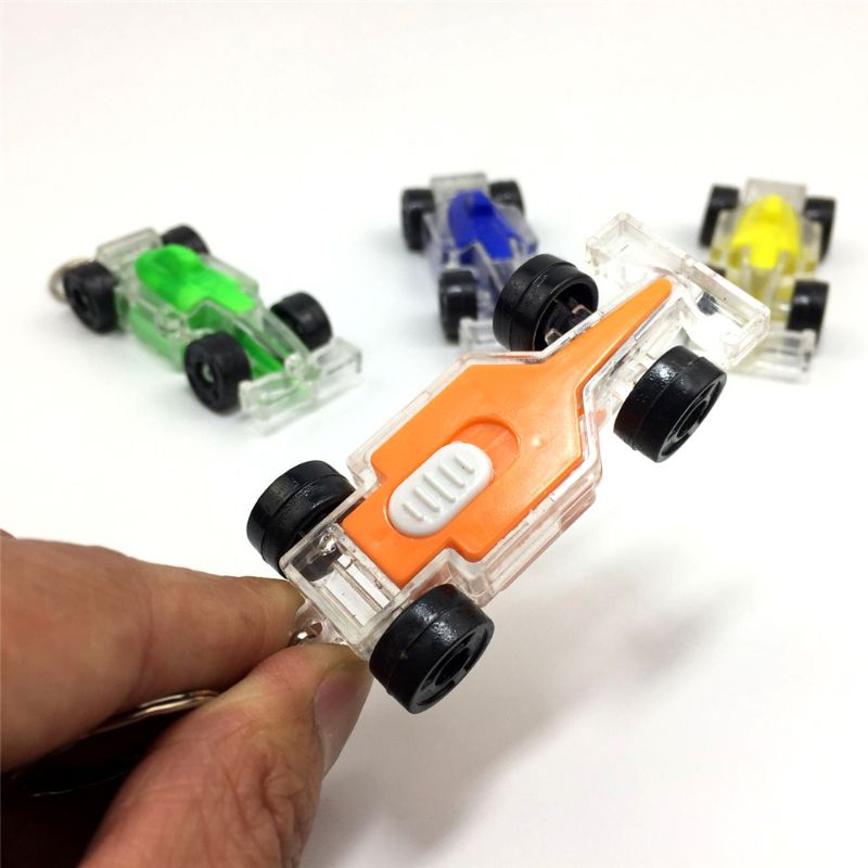 HBB 1PC Bambini mini Lampeggiante Giocattoli Del Fumetto auto A Forma di Portachiavi Veicolo gadget Regalo Torcia Elettrica per Bambini Giocattoli Luminosi di colore Casuale