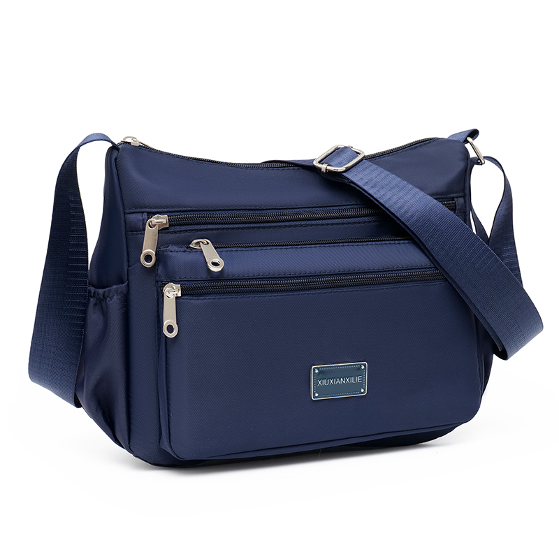 Taske dame skuldertaske med stor kapacitet vandtæt og slidstærk multi-lomme pendler fritid udendørs crossbody-taske: Blå