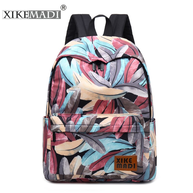 Xikemadi marca feminina mochila design pena impressão juventude anti-roubo viagem packbag meninas estudante sacos de escola feminino bagpack