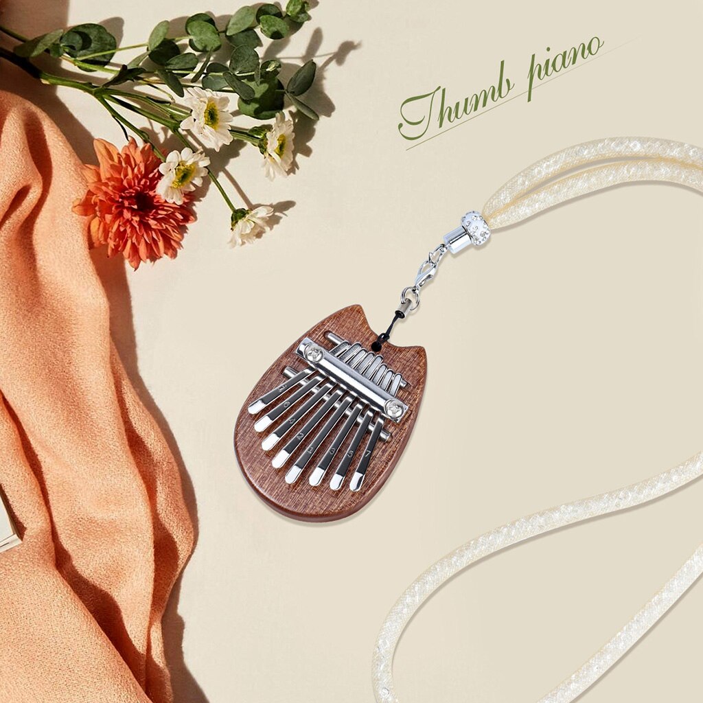 8 llaves Mini Piano de pulgar Kalimba Mbira sólido de madera de juguete de con cordón colgantes para principiantes