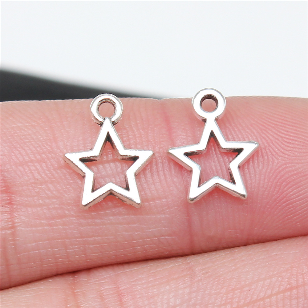 10 Uds. De colgante de estrella hueca de 12x10mm de Color plateado Retro para collar, pendientes, pulsera, fabricación de accesorios de joyería DIY