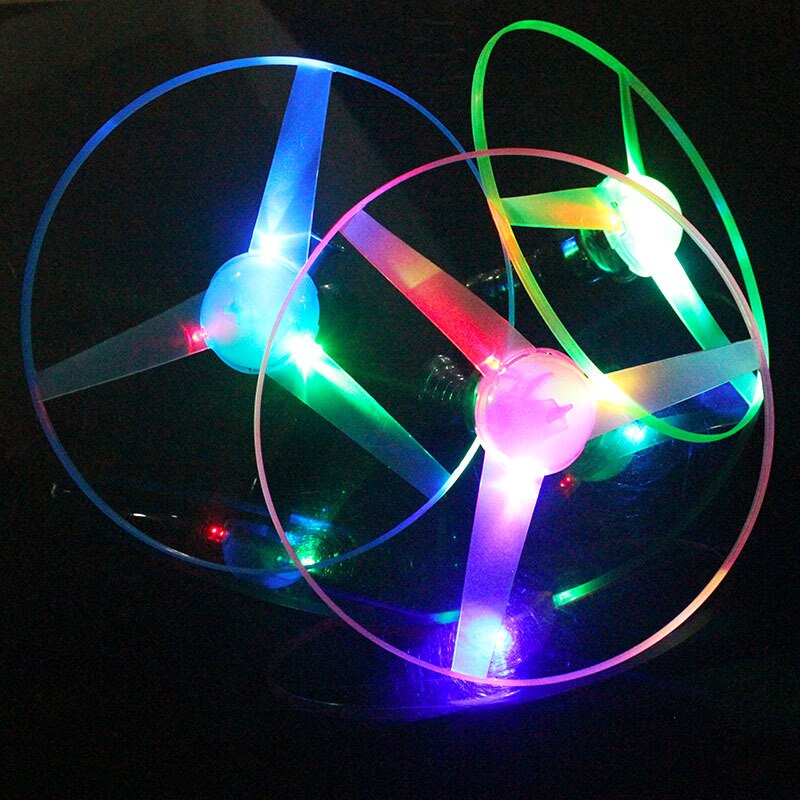 1 pz vendita calda divertimento sport all&#39;aria aperta Pull Line piattino giocattoli illuminazione a LED UFO interazione genitore-figlio creativo Spin-off dischi volanti