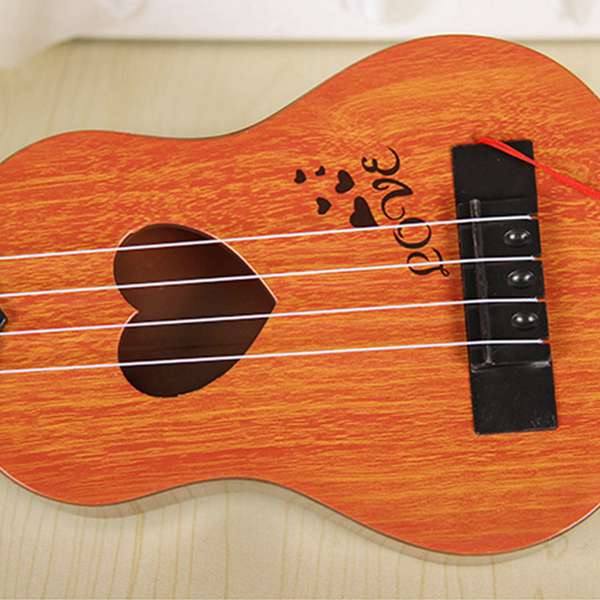 Musikinstrument mini ukulele børn guitar legetøj skole spille spil farve tilfældig