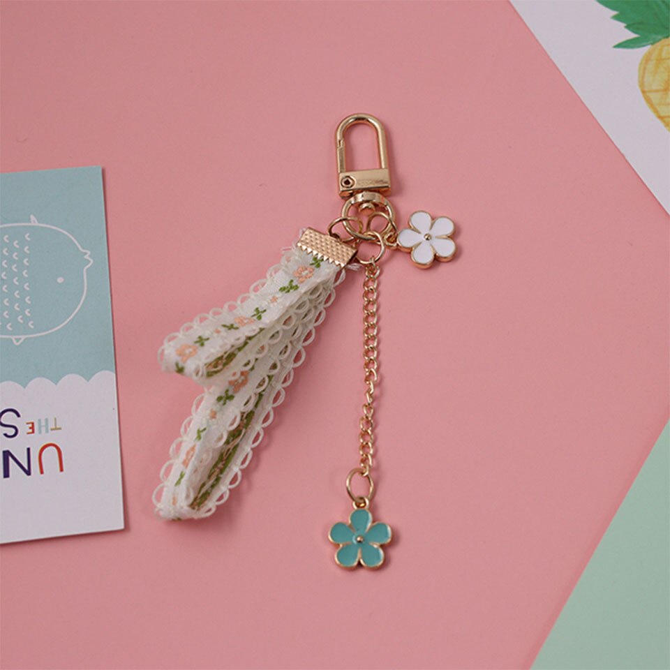 Söt tusensköna blomma svett färsk spets smart telefonrem snoddar för iphone samsung dekor mobiltelefon handledsrem rep telefon charm