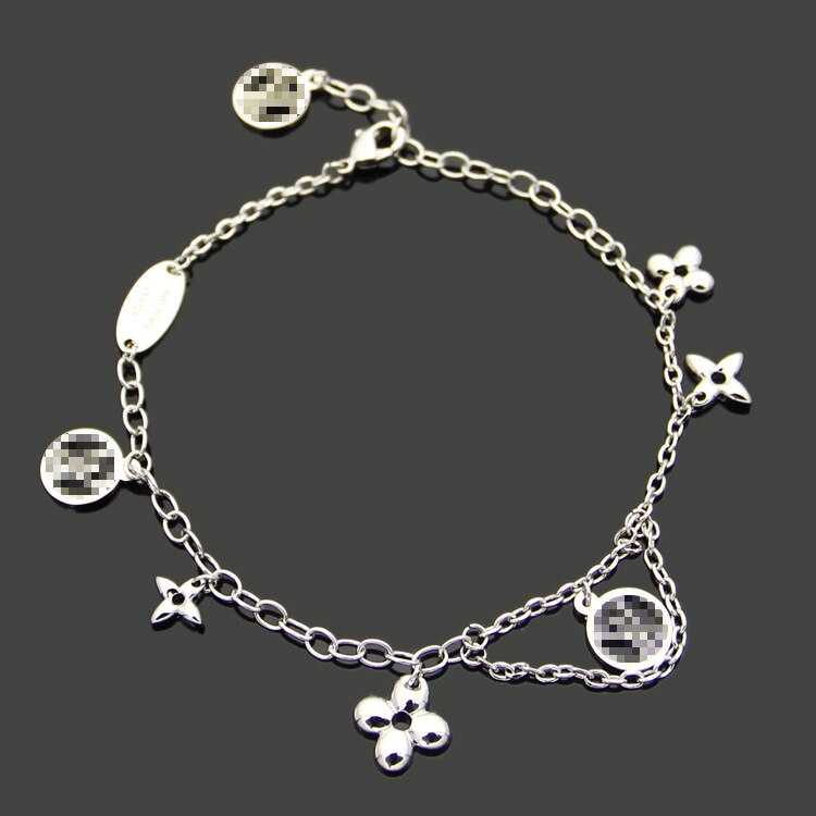 Bracelet en acier titane V quatre feuilles fleur double couche Bracelet femmes commerce extérieur multi accessoires