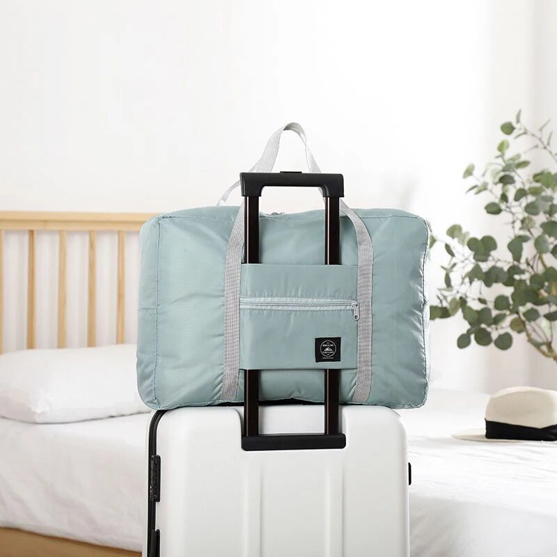 Modieuze opvouwbare reistas: spatwaterdichte handbagage met grote capaciteit voor unisex fitness- en vakantiereizen: Sky Blue