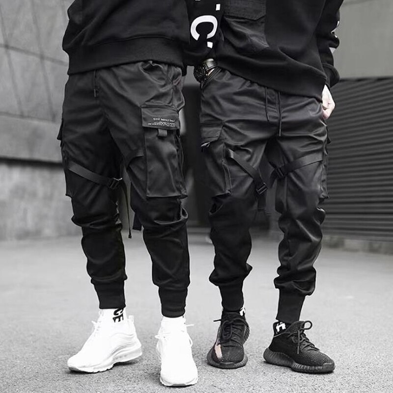 Hip Hop niño Multi-Bolsillo elástico de cintura Harem pantalones hombres Streetwear Punk Casual pantalones Jogger hombres bailando negro pantalón