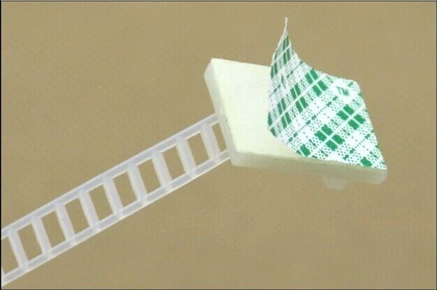 CL-1 adjustable self-adhesive cable clamp