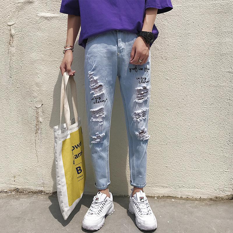 Super oversized ripped jeans men's broken copper loose-fitting beggar South Korea scraped ninth pants pencil jeans for men