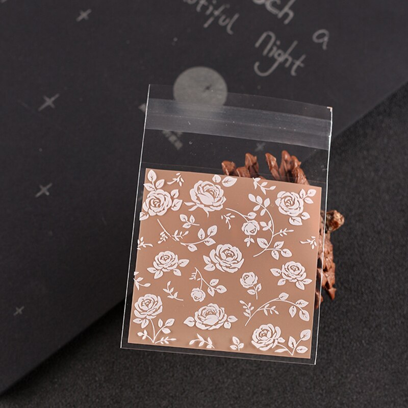 100Pcs packaging bag plastic self-adhesive DIY biscuit packaging bag bread baking supplies candy packaging party decoration: flower / 7x7cm