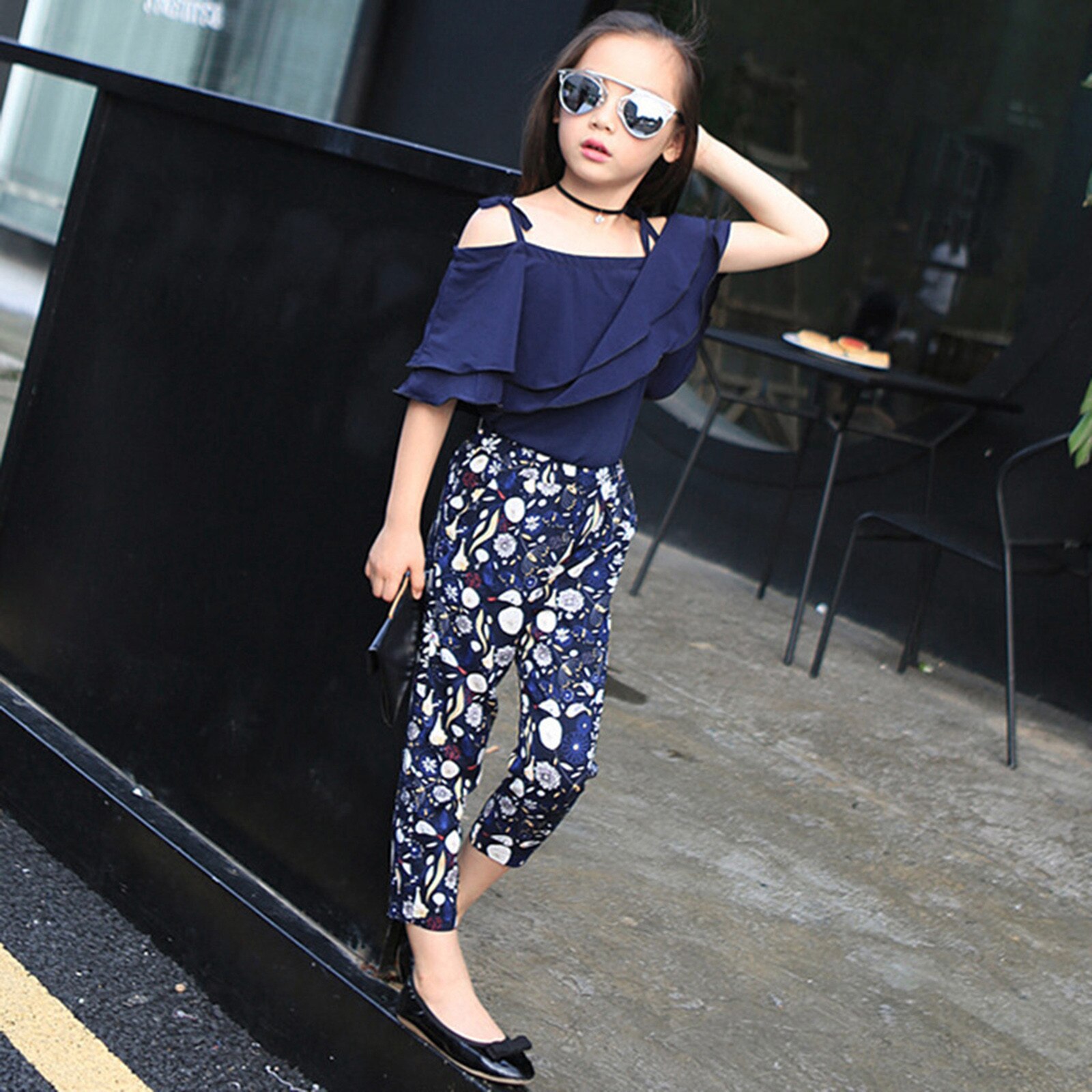 Moda bambini ragazza abbigliamento estate spalla aperta Sling Ruffle T-Shirt top + pantaloni floreali Set elegante per abiti da ragazza grande adolescente