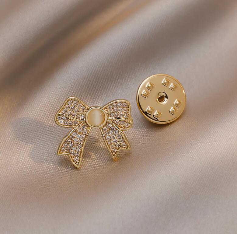 Broches para mujer, Pin de solapa antideslumbrante de Metal, alfileres fijos para ropa, suéter, abrigo, accesorios de ropa, broche, lazo bonito a la: GINGER / COLOR ORO ROSADO