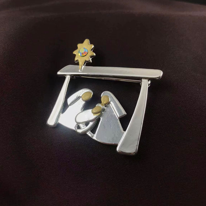 creatieve ontwerpbroche voor kerstcollectie als een kind geboren Memorial Pins