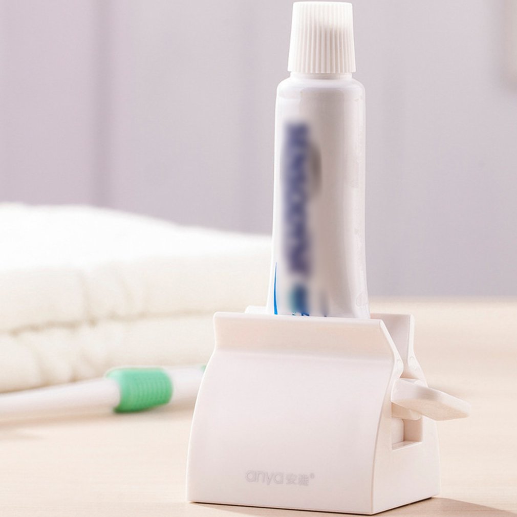 Rullende rør tandpasta presemaskiner dispenser sædeholder stativ let rengøring badeværelse produkter husholdningsartikler