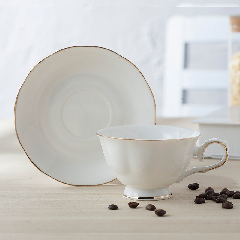 Style européen supérieur ivoire blanc en céramique os chine porcelaine Drinkware service à café avec soucoupe tasse et cuillère Rose doré