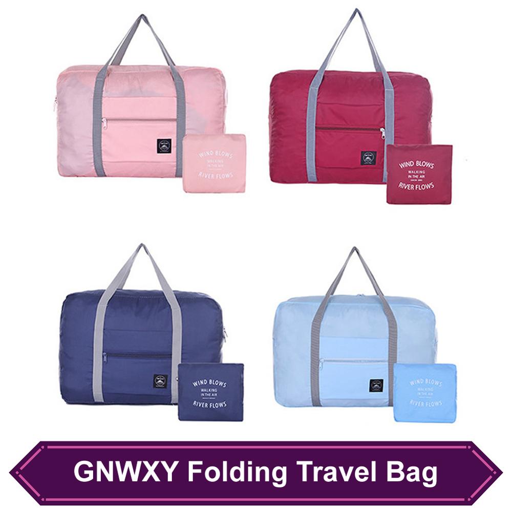 Gnwxy 2020 nova náilon dobrável saco de viagem grande capacidade moda fim de semana bolsa para homens mulheres carry on sacos de bagagem dropshipping